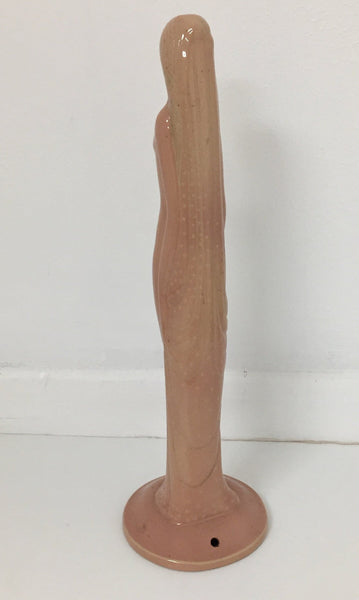 Salmon colored art deco lamp base in the form of a woman designed