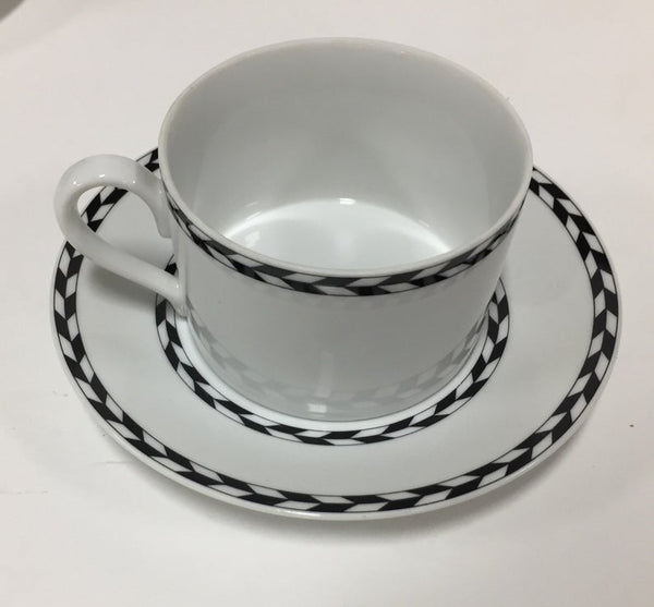 Set of five postmodern coffee cups and saucers by Swid Powell