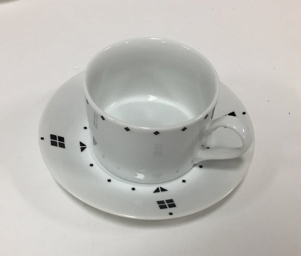 Set of five postmodern coffee cups and saucers by Swid Powell
