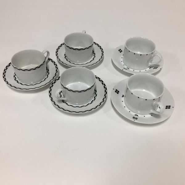 Set of five postmodern coffee cups and saucers by Swid Powell