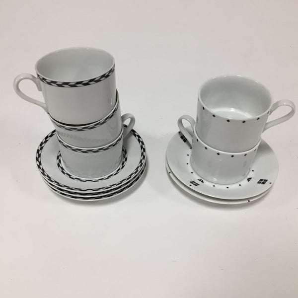 Set of five postmodern coffee cups and saucers by Swid Powell
