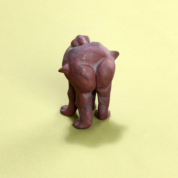 Surreal ceramic anthropomorphic sculpture of head with four legs