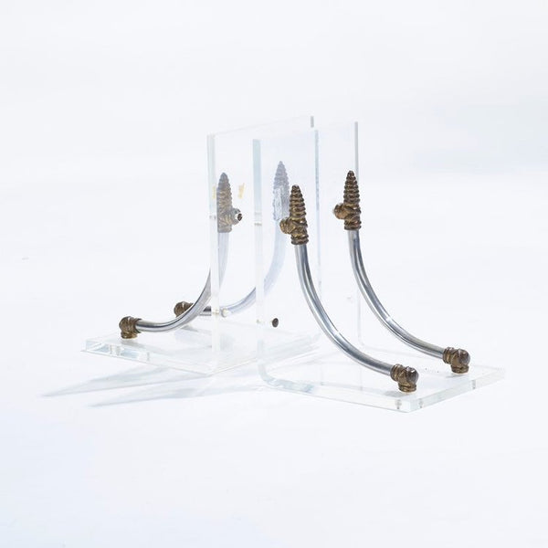 Vintage lucite, aluminum, and brass Hollywood regency bookends in the style of Maison Jansen