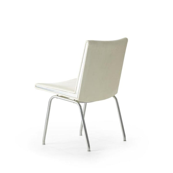 White vinyl and steel Kastrup chair by Hans Wegner made by A.P. Stolen